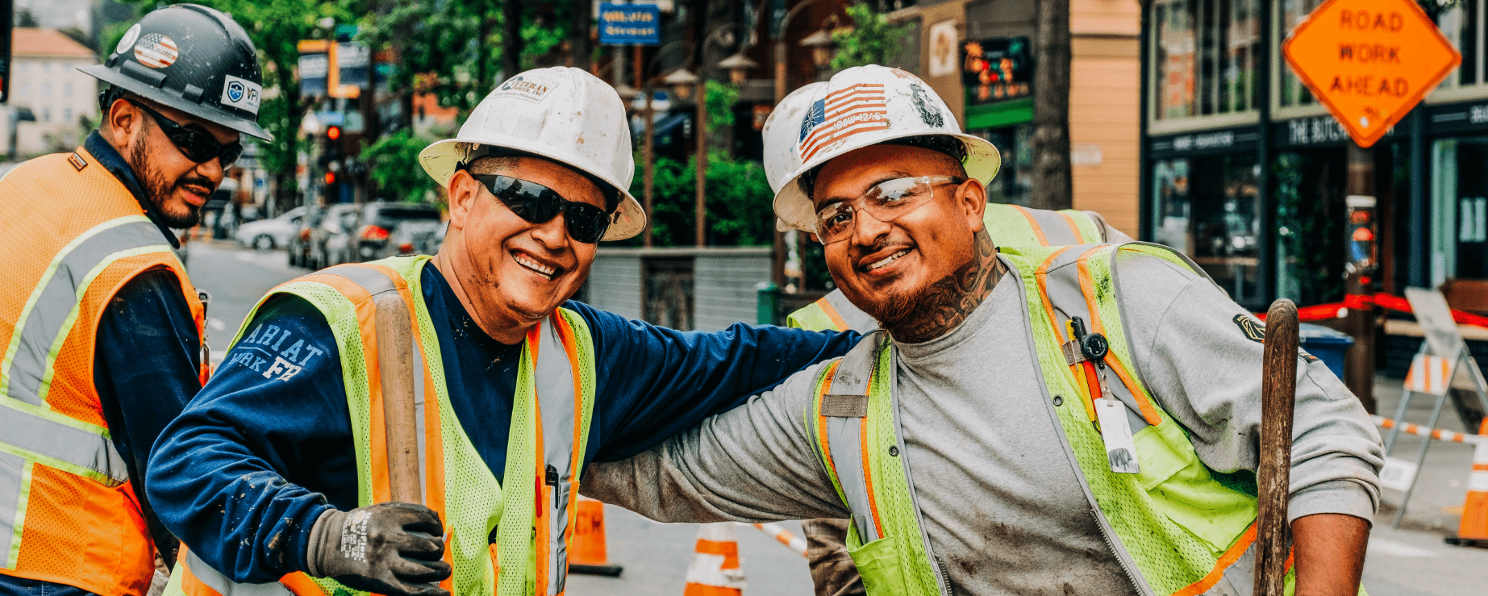 Charge workers in hard hats