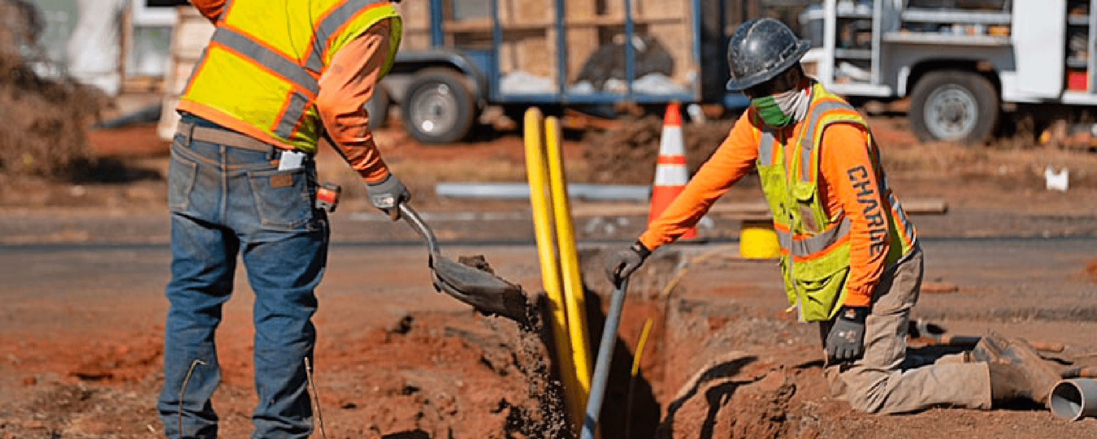 Charge workers in hard hats