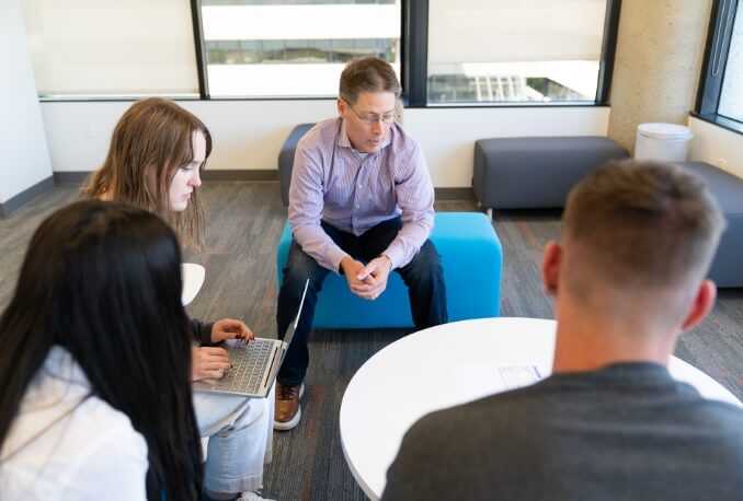 Charge interns having a discussion