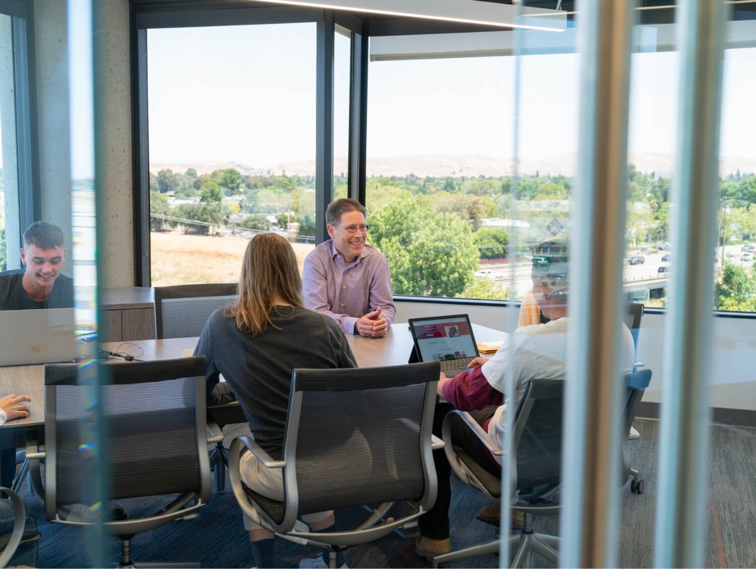 people talking in a conference room