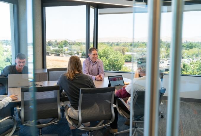 Charge interns in conference room